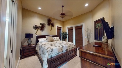 Located on the tranquil shores of the gated community of The - photo 27