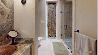 Located on the tranquil shores of the gated community of The - photo 30