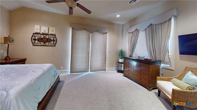 Located on the tranquil shores of the gated community of The - photo 32