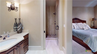 Located on the tranquil shores of the gated community of The - photo 34