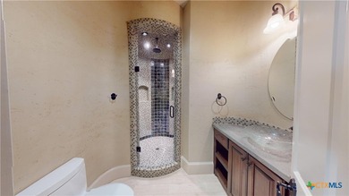 Located on the tranquil shores of the gated community of The - photo 36