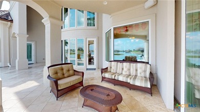Located on the tranquil shores of the gated community of The - photo 39