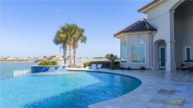 Located on the tranquil shores of the gated community of The - photo 42