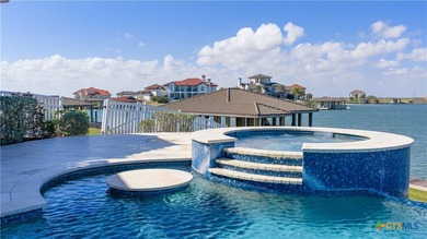 Located on the tranquil shores of the gated community of The - photo 43