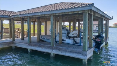 Located on the tranquil shores of the gated community of The - photo 45