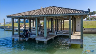 Located on the tranquil shores of the gated community of The - photo 46