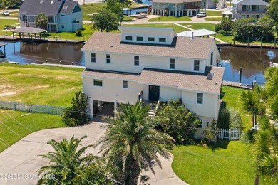 Waterfront living just off Mallini! This 3-bedroom, 2.5-bath - photo 2