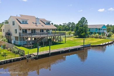 Waterfront living just off Mallini! This 3-bedroom, 2.5-bath - photo 3