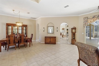 Located on a double lot, this Sugarmill Woods pool home is sure - photo 7