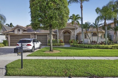 Welcome to luxury living in the prestigious Versailles community - photo 2