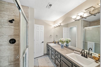 Set within a peaceful gated community, this Santa Fe home blends