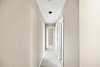 Set within a peaceful gated community, this Santa Fe home blends