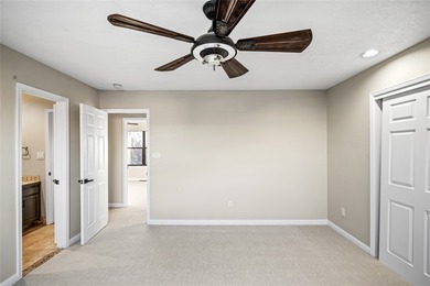 Set within a peaceful gated community, this Santa Fe home blends