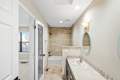 Set within a peaceful gated community, this Santa Fe home blends