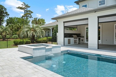 Custom luxury living in The Bluffs on the Waterway. This - photo 36