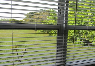 BEAUTIFUL, VERY SPACIOUS CORNER UNIT OFFERING ABUNDANT NATURAL