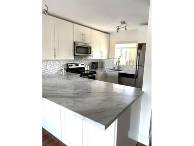 Intracoastal living at the turn of a key. Beautiful remodeled - photo 6