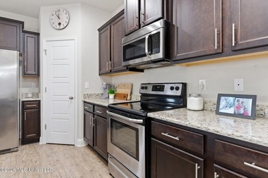 Welcome to this beautifully maintained 4-bedroom, 2-bath home in - photo 9