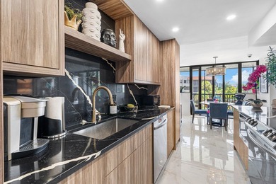 Welcome to this beautifully renovated residence featuring 2 - photo 12