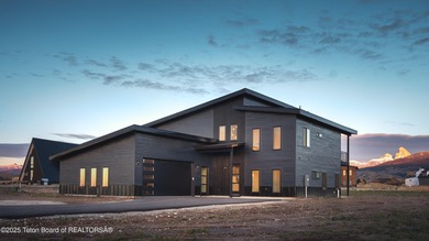 Lake Home For Sale in Victor, Idaho