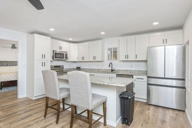 Explore the extensive possibilities at 9648 Bone Bluff Drive, a - photo 20