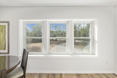 Explore the extensive possibilities at 9648 Bone Bluff Drive, a - photo 32