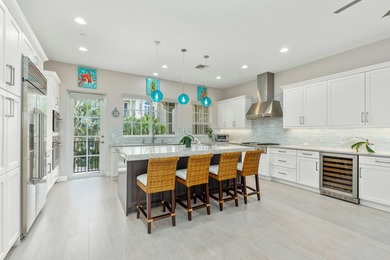 Tucked away in an intimate gated community just one block from - photo 1