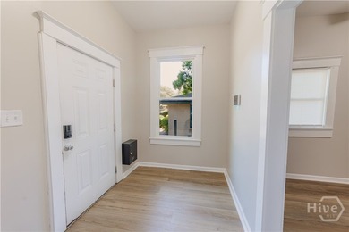 This beautifully renovated home offers the perfect blend of - photo 3