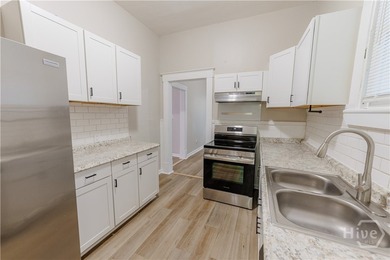 This beautifully renovated home offers the perfect blend of - photo 6
