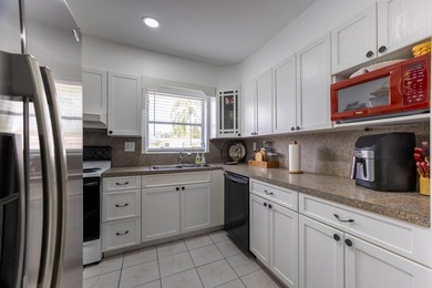 Charming and move-in ready 2-bedroom, 2-bath villa located in - photo 5