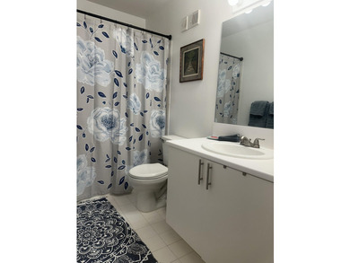 Welcome to this waterfront condominium situated in Yacht Club on - photo 5