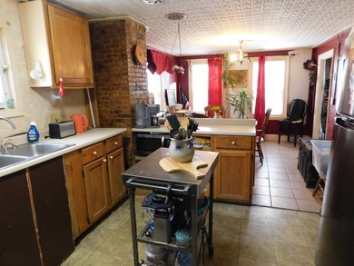 Investors take notice! This 3 bedroom 2 bathroom home nestled in - photo 7