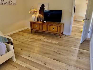 Beautifully renovated 2nd story lake front condominium in a - photo 21