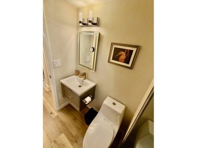 Beautifully renovated 2nd story lake front condominium in a - photo 28