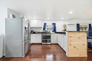 Completely renovated and move-in ready, this home at 105 Major - photo 12