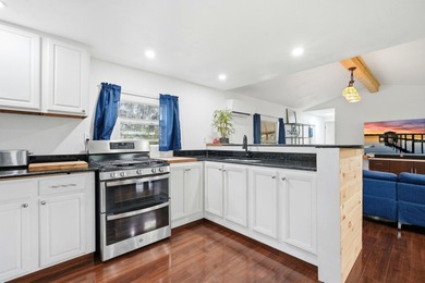 Completely renovated and move-in ready, this home at 105 Major - photo 14