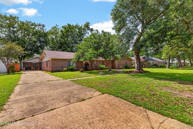 4BR/3BA home situated on a spacious 0.54-acre lot in the - photo 3