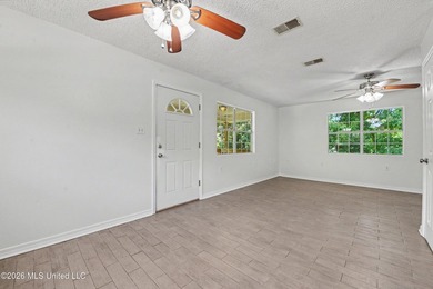 This cozy retreat home is in Bayou La Croix Estates, Bay St - photo 6