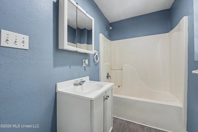 This cozy retreat home is in Bayou La Croix Estates, Bay St - photo 7