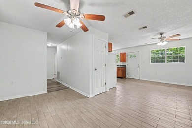 This cozy retreat home is in Bayou La Croix Estates, Bay St - photo 8