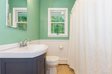 Welcome to this charming 3-bedroom, 2-bath home tucked away on a - photo 17