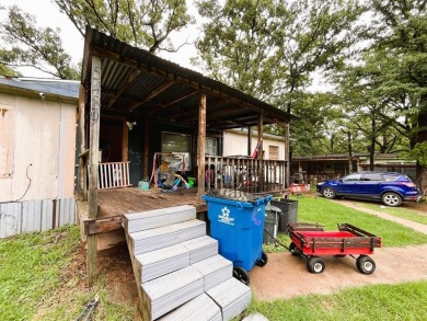 Lake Home For Sale in Log Cabin, Texas