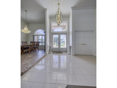 Experience exceptional waterfront living in this stunning - photo 8