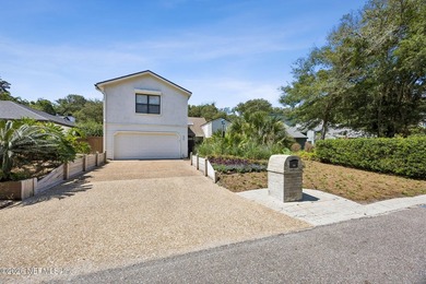 Fully renovated and just a 4-minute walk to the beach, this - photo 1