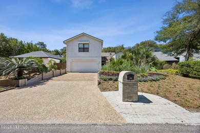 Fully renovated and just a 4-minute walk to the beach, this - photo 2