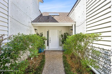 Fully renovated and just a 4-minute walk to the beach, this - photo 3