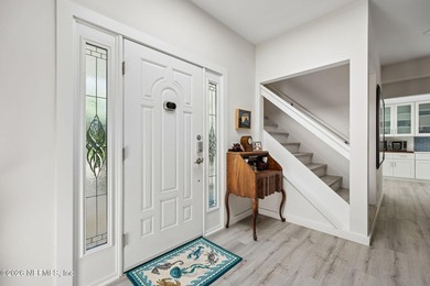 Fully renovated and just a 4-minute walk to the beach, this - photo 6