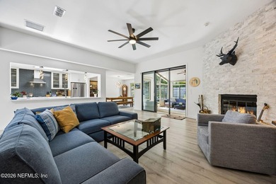 Fully renovated and just a 4-minute walk to the beach, this - photo 10