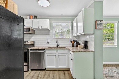 New Price! Welcome home to this beautifully renovated all-brick - photo 12