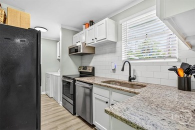 New Price! Welcome home to this beautifully renovated all-brick - photo 13